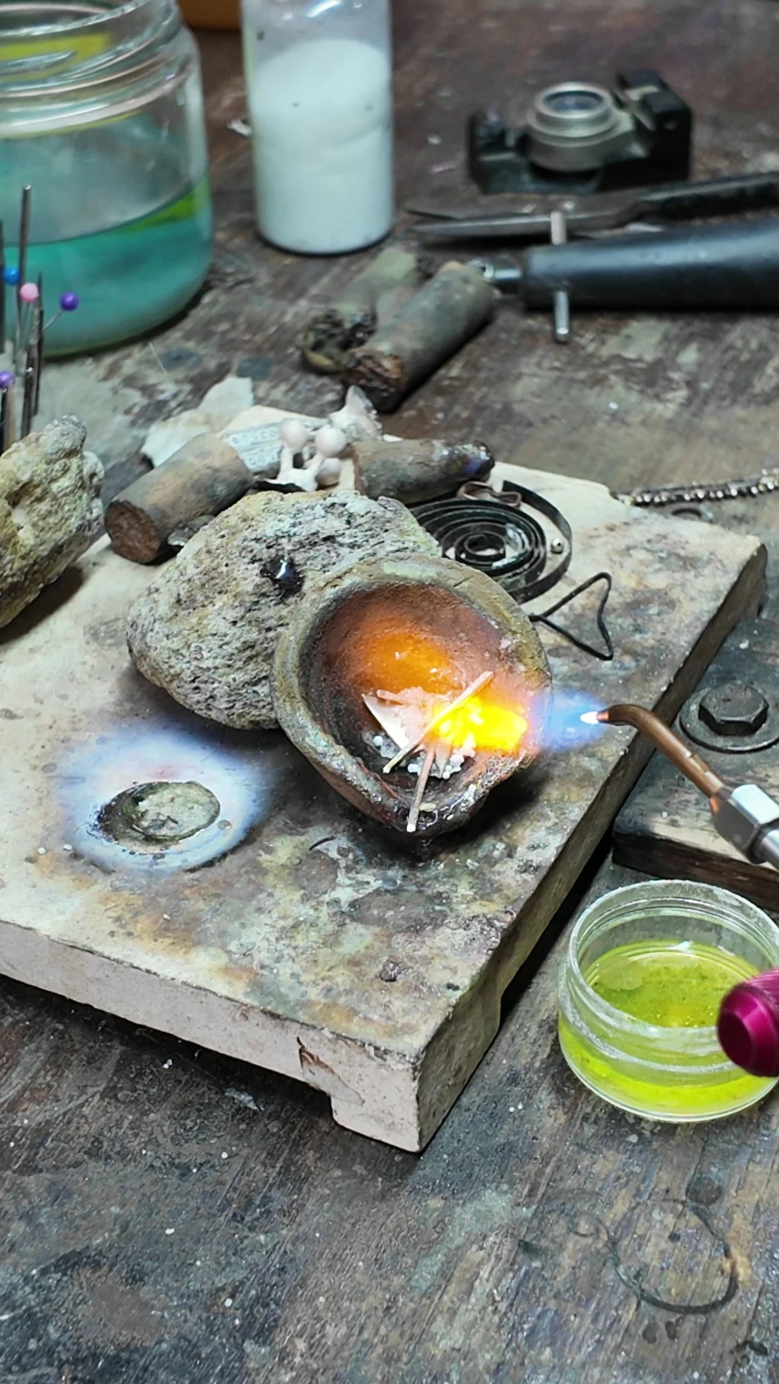 A glowing crucible at the jewellery workshop.